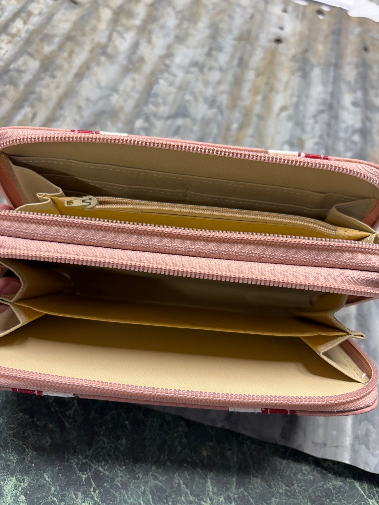 Stylish Pink Wallet with Red and White Accents
