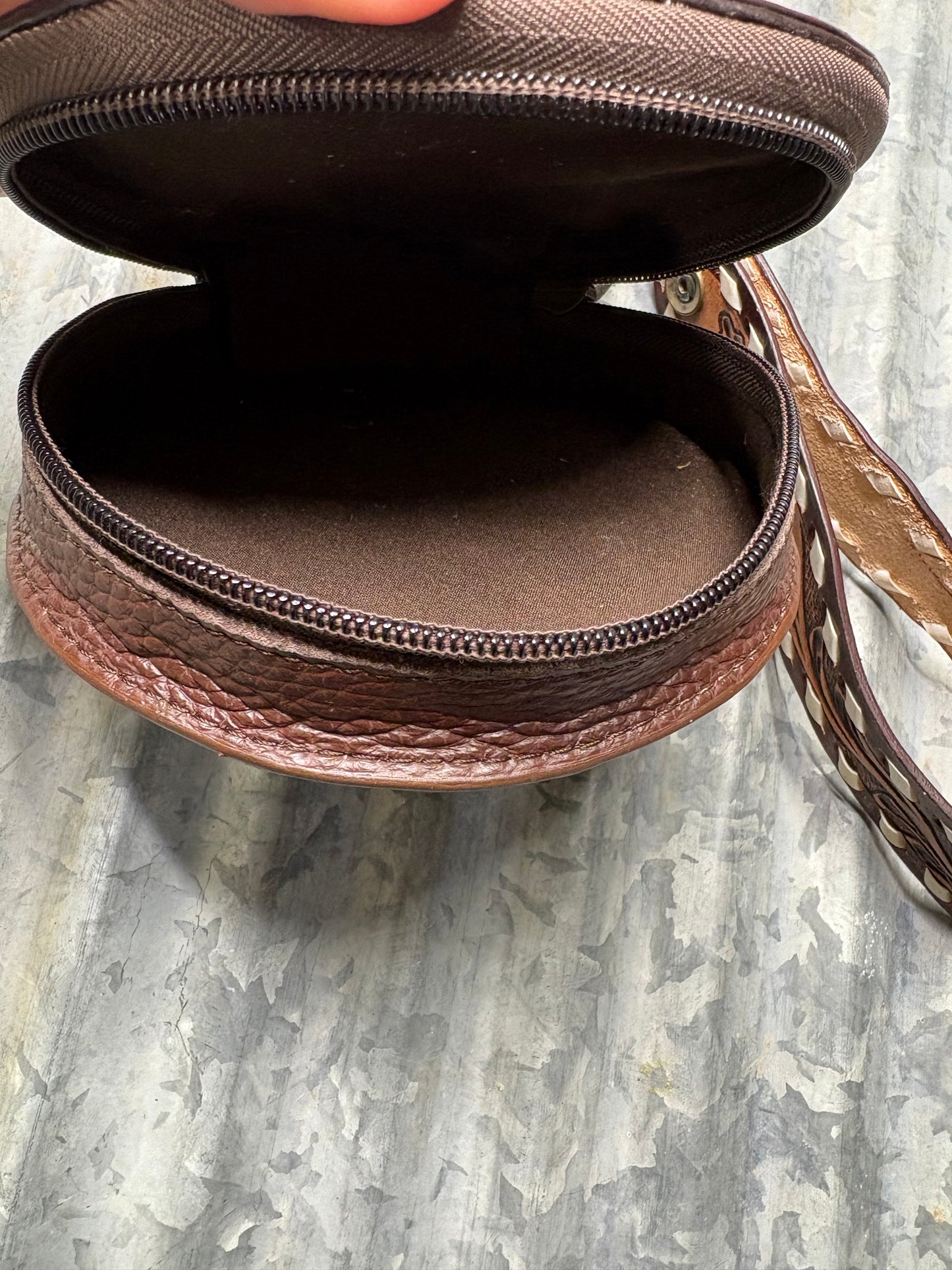 Handcrafted Leather Round Crossbody Bag with Western Embossed Design