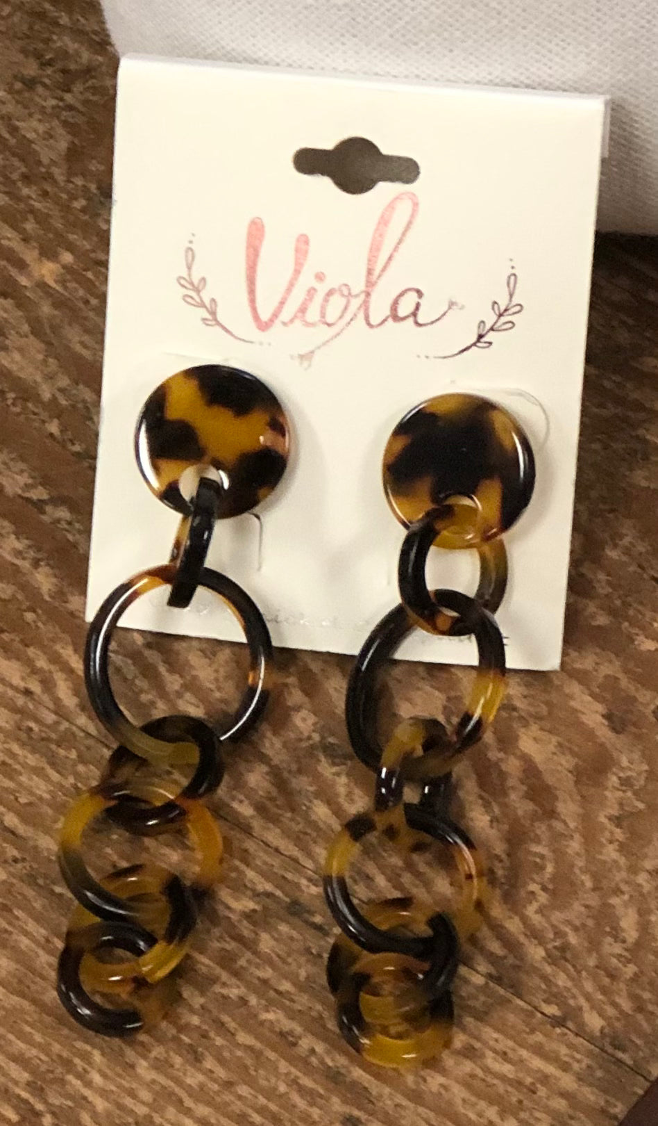 Tortoise Shell Circle Drop Earrings” or “Viola Tortoiseshell Dangle Hoop Earrings